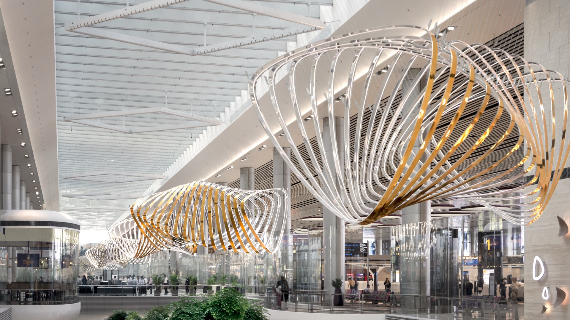 Wide view of Petalclouds across the terminal galleria