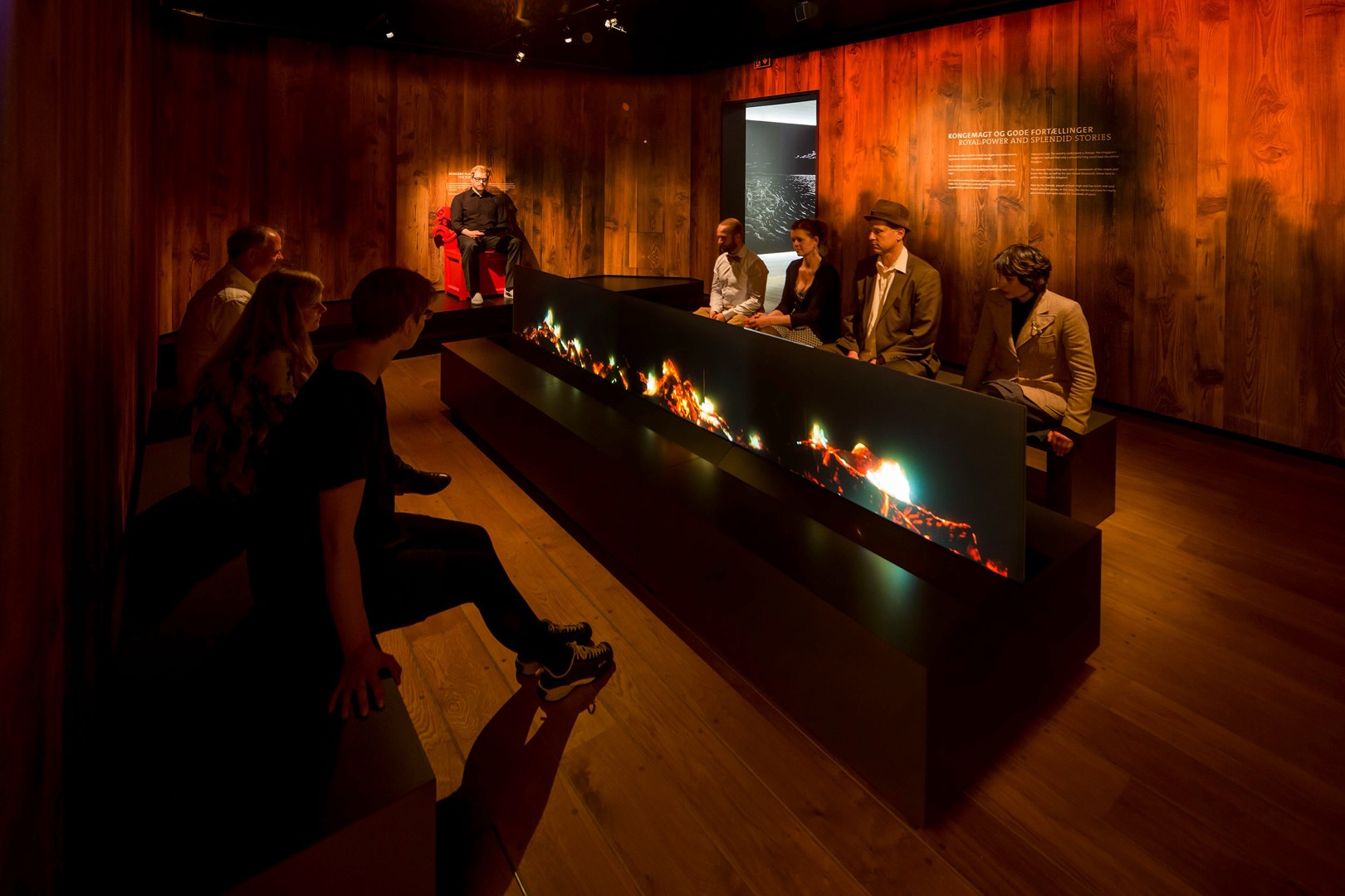 Storytelling fireplace scene evoking Viking longhouse